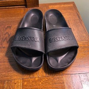 Birkenstock black slides.